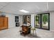 Finished basement with an arcade game and bar at 625 S Magnolia St, Mooresville, NC 28115