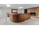Finished basement with a fireplace and large leather sofa at 625 S Magnolia St, Mooresville, NC 28115