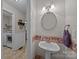 Charming half bathroom with pedestal sink and decorative accents at 635 Timberlane Trl, Salisbury, NC 28147