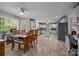 Spacious kitchen with dining area featuring modern appliances, tile floors, and ample cabinet space at 635 Timberlane Trl, Salisbury, NC 28147