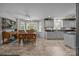 Well-lit kitchen with a dining area, tile floors, and ample natural light at 635 Timberlane Trl, Salisbury, NC 28147