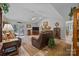Spacious living room featuring hardwood floors, comfortable seating, and a ceiling fan at 635 Timberlane Trl, Salisbury, NC 28147