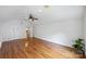 Large bedroom with lots of light and hardwood floors at 7050 Knightswood Dr, Charlotte, NC 28226