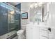 Stylish bathroom featuring a glass enclosed shower with dark blue accent tiling and modern fixtures at 790 Herrons Ferry Rd, Rock Hill, SC 29730