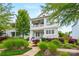 Charming two-story white home with inviting double porches and a well-manicured front garden at 790 Herrons Ferry Rd, Rock Hill, SC 29730
