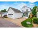 Exterior of the home showcasing a well-maintained yard, driveway, and a two-car garage at 790 Herrons Ferry Rd, Rock Hill, SC 29730