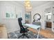 Stylish office space with sleek desk, decorative lighting, and easy access to bathroom at 790 Herrons Ferry Rd, Rock Hill, SC 29730
