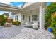Spacious covered patio with stylish furniture, tiled floors, and a dining area perfect for outdoor living at 790 Herrons Ferry Rd, Rock Hill, SC 29730