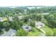 Aerial view of a home with solar panels, a gazebo, and manicured landscaping at 8259 Camelia Ln, Denver, NC 28037
