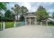 Backyard gazebo with a white wood deck, perfect for outdoor relaxation and entertaining at 8259 Camelia Ln, Denver, NC 28037