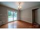 A simple dining area next to french doors at 8259 Camelia Ln, Denver, NC 28037