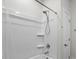 A full bathroom with a shower and white shower curtain offers a clean and simple design at 9009 Myrna Dr, Gastonia, NC 28056