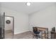 Home office featuring wood-look floors and minimalist desk and chair at 9009 Myrna Dr, Gastonia, NC 28056