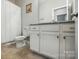 Bathroom featuring granite countertops and a shower-tub combo at 9511 Spurwig Ct, Charlotte, NC 28278