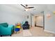 Bedroom with chairs, rug, and closet at 9511 Spurwig Ct, Charlotte, NC 28278