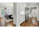 Transitional dining area with stainless steel refrigerator at 9511 Spurwig Ct, Charlotte, NC 28278