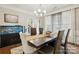 Charming dining room featuring a large aquarium, creating a unique ambiance at 9511 Spurwig Ct, Charlotte, NC 28278