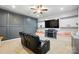 Cozy living room featuring a fireplace, built-in shelves, and a comfortable recliner at 9511 Spurwig Ct, Charlotte, NC 28278
