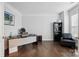 Spacious office with hardwood floors, neutral walls, and comfortable seating area at 9511 Spurwig Ct, Charlotte, NC 28278