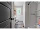 Bright bathroom featuring a walk-in shower, toilet, and vanity at 1010 Fallston Rd, Shelby, NC 28150