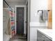Bathroom featuring a walk-in shower, vanity, and stylish door at 1010 Fallston Rd, Shelby, NC 28150