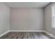 This bedroom has neutral paint, hardwood floors, and trim at 1010 Fallston Rd, Shelby, NC 28150