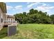 Spacious backyard with well-kept lawn, and a view of the deck, great for outdoor activities and relaxation at 10198 Tintinhull Dr, Fort Mill, SC 29707
