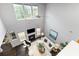 Open living room with fireplace and abundant natural light from large windows, creating a bright and inviting space at 10198 Tintinhull Dr, Fort Mill, SC 29707