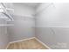Spacious walk-in closet with wire shelving, offering plenty of storage space at 10198 Tintinhull Dr, Fort Mill, SC 29707