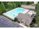Overhead view of community pool with sun loungers and convenient parking for residents at 10198 Tintinhull Dr, Indian Land, SC 29707