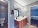 Well-lit bathroom with a double vanity, offering ample space and storage with a separate room for the toilet at 1060 S Lentz Harness Shop Rd, Mount Pleasant, NC 28124