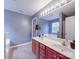 Stylish bathroom featuring a double vanity, large mirror, and plenty of lighting for a functional design at 1060 S Lentz Harness Shop Rd, Mount Pleasant, NC 28124