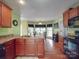 Bright kitchen with a breakfast bar, stainless steel appliances, and an adjacent dining area, perfect for cooking at 1060 S Lentz Harness Shop Rd, Mount Pleasant, NC 28124