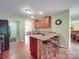 Open kitchen featuring a breakfast bar, stainless steel appliances, and seamless flow to other living spaces at 1060 S Lentz Harness Shop Rd, Mount Pleasant, NC 28124