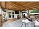 The covered back deck is perfect for outdoor living, with views of the yard at 1119 Thornsby Ln, Matthews, NC 28105