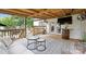 Spacious back deck with outdoor seating, perfect for entertaining guests or relaxing in the fresh air at 1119 Thornsby Ln, Matthews, NC 28105