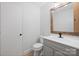 Fresh bathroom with a gray vanity, black faucet, and neutral color scheme at 1119 Thornsby Ln, Matthews, NC 28105