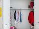 View of a closet with rod, shelf, and clothing; door on left and right at 1119 Thornsby Ln, Matthews, NC 28105