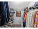 Walk-in closet with ample shelving and organized clothing racks at 1119 Thornsby Ln, Matthews, NC 28105