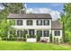 Traditional two-story home with a well-maintained front lawn and lovely curb appeal at 1119 Thornsby Ln, Matthews, NC 28105