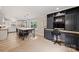 Open kitchen with a large island, modern appliances, and custom cabinetry at 1119 Thornsby Ln, Matthews, NC 28105