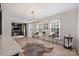 Spacious living room with hardwood floors, natural light, and a stylish open design at 1119 Thornsby Ln, Matthews, NC 28105