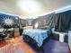 Comfortable bedroom with moody decor, unique accents, and ample space at 121 Patrick St, Gastonia, NC 28054