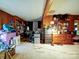 This bedroom features wood walls, carpet flooring, and plenty of potential at 121 Patrick St, Gastonia, NC 28054
