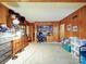 Spacious bedroom with carpet flooring and wood walls, offering a cozy retreat at 121 Patrick St, Gastonia, NC 28054