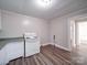 Kitchen area with tile flooring and newer stove at 121 Patrick St, Gastonia, NC 28054