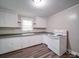 Kitchen with cabinets, sink, oven and modern flooring at 121 Patrick St, Gastonia, NC 28054