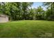 Sprawling backyard with plenty of green space and outbuilding at 1369 Timberlane Ter, Mooresville, NC 28115