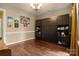 Bright room with hardwood floors and a built in wall unit at 1369 Timberlane Ter, Mooresville, NC 28115