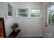 Cozy entryway with two windows, a wooden bench, and a charming welcome feel at 143 Hallman St, Cherryville, NC 28021